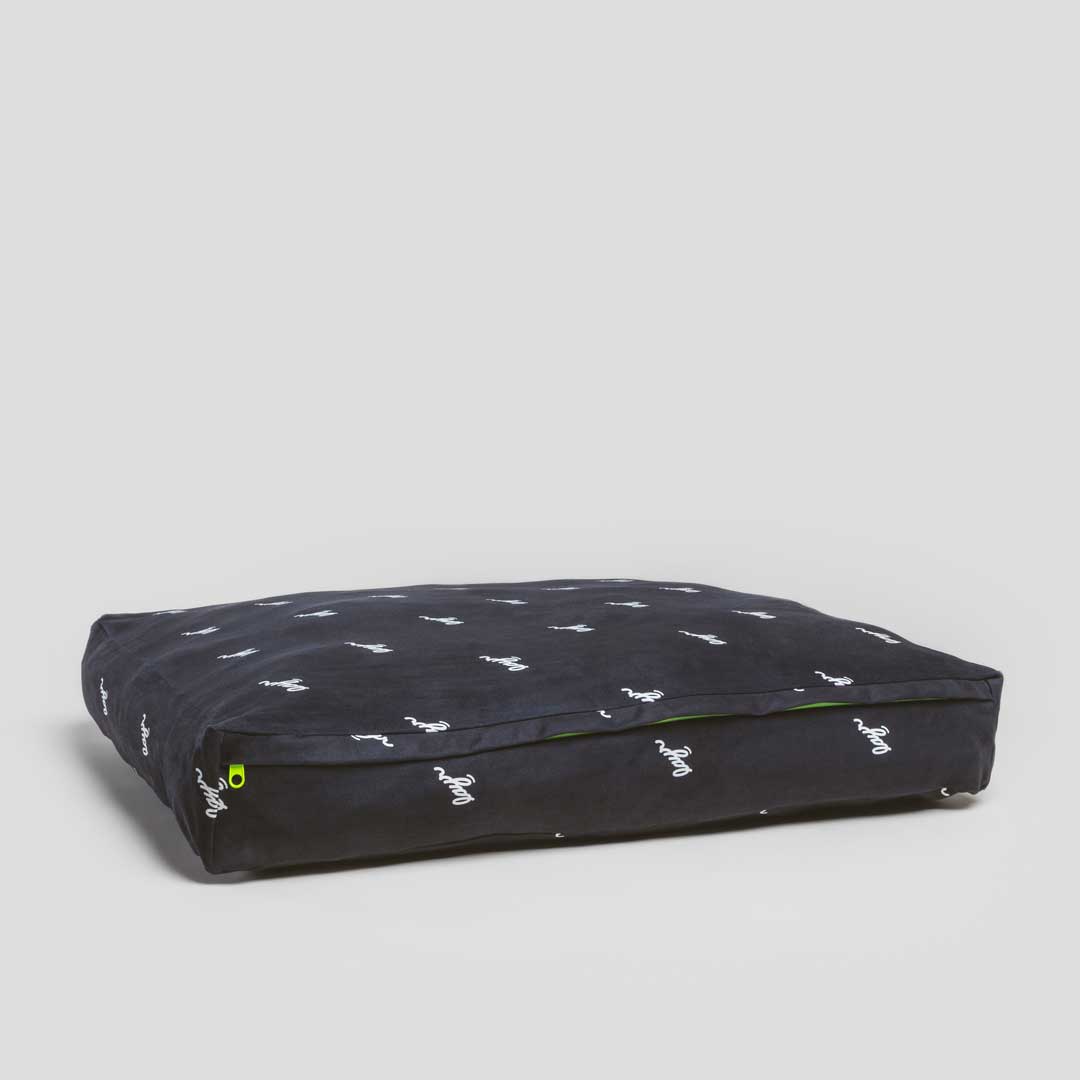Black eco-friendly dog bed. Water resistant with washable, sustainable materials for easy cleaning and long-lasting comfort.
