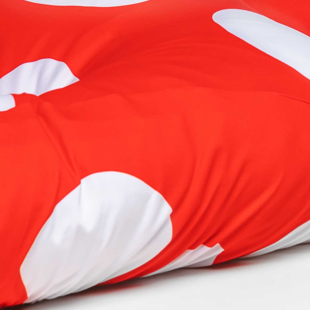 Sustainable dog bed. Machine washable, fitted dog bed cover, anti microbial, anti odor, water resistant red and white spots dog bed cover.