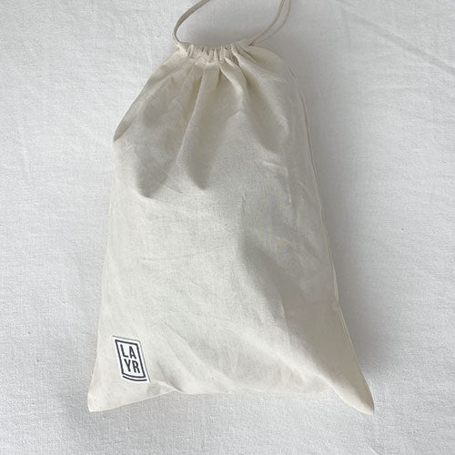 Dog laundry bag. Doubles as a travel bag. Pack treats, toys and your dog bed sheets. Adventure awaits with this personalized doggy bag. Upgrade your dog's bag with our iron on patches.