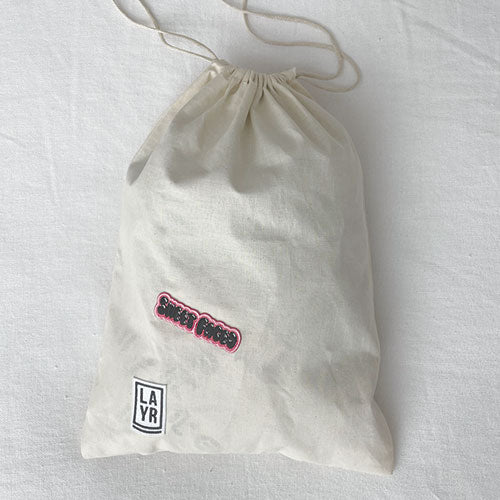 Dog laundry bag. Doubles as a travel bag. Pack treats, toys and your dog bed sheets. Adventure awaits with this personalized doggy bag. Upgrade your dog's bag with our iron on patches.