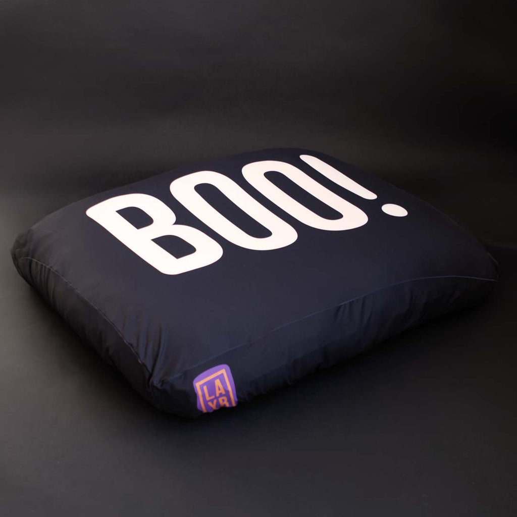 Halloween dog bed sheet with Boo! graphic and custom monster logo.