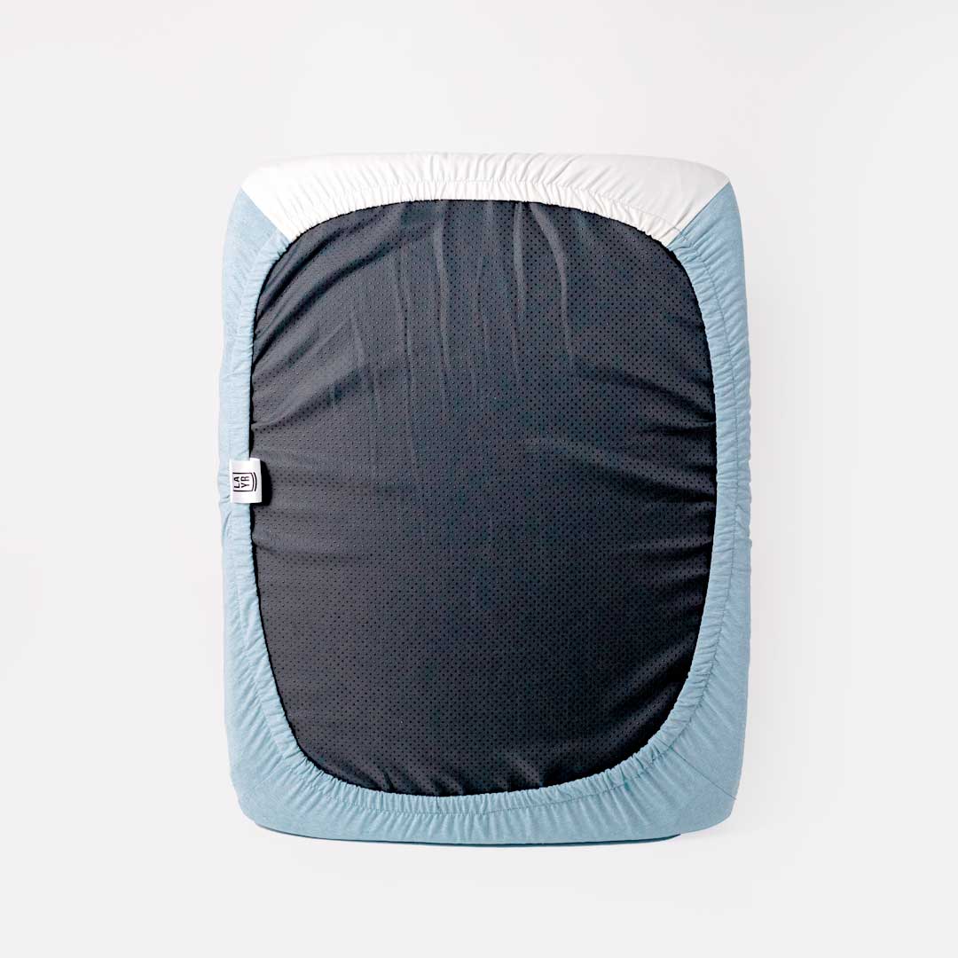 Blue sustainable machine washable fitted dog bed cover.