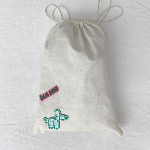 Dog laundry bag. Doubles as a travel bag. Pack treats, toys and your dog bed sheets. Adventure awaits with this personalized doggy bag. Upgrade your dog's bag with our iron on patches.